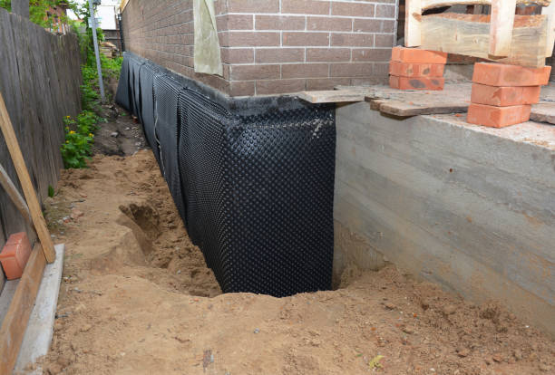 SJ Waterproofing Pros technician performing targeted Waterproofing assessment in Fairfield, NJ